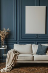 Scandinavian interior design of modern living room. Sofa against navy blue wall with blank mock up poster