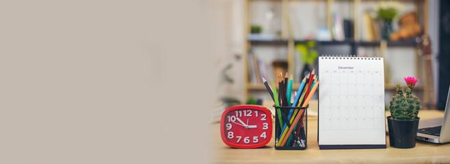 2025 Calendar desk place on business table. Desktop Calender for Planner to plan agenda, timetable, appointment, organization, management each date, month, and year on wooden office table-banner