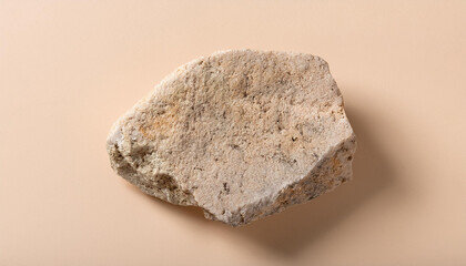 Obraz premium Empty stone podium on light beige background. Minimal podium, display product presentation.