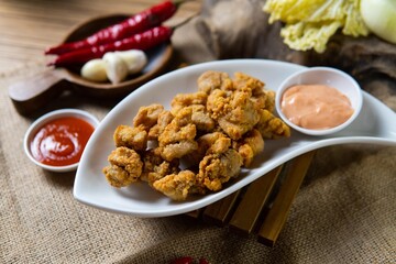 Indonesian snack appetizer deep fried tempe chicken calamari golden brown
