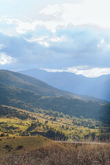 Naklejka premium Scenic Landscapes of the Pyrenees: Mountains, Waterfalls, and Rustic Villages