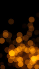 Obraz premium Golden abstract bokeh on black background isolated with white highlights, png