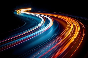 Captivating Light Trails on a Winding Road at Night