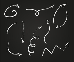 A set of arrow icons drawn in white chalk. Pencil pointers in doodle style. Directional pointers drawn in chalk, isolated on a blackboard background.