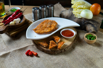 Indonesian snack appetizer deep fried tempe chicken calamari golden brown