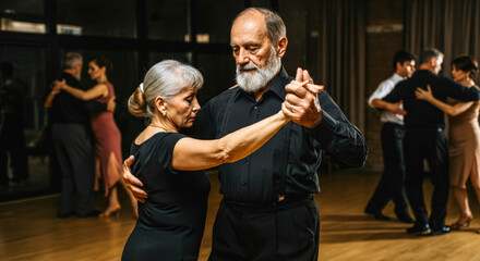 Elderly couple dancing tango in ballroom setting for joyful movement and connection