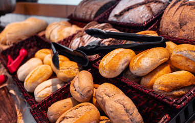 A variety of freshly baked goods at the grocery store.