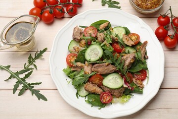 Delicious fresh tuna salad on white wooden table, flat lay