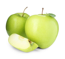 Whole and cut fresh green apples isolated on white