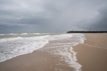 beach stormy sea waves and sand