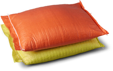 stack of orange and yellow polypropylene pp bag or sack full of rice grains isolated white background, blank package mockup template of ingredient cooking or agricultural products