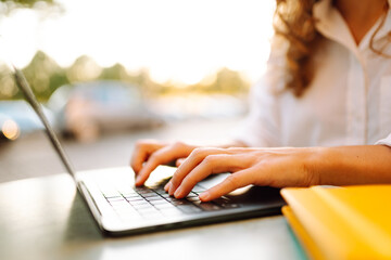 Close up. Person typing on a laptop. Business, Freelance, Shopping, education. Online.