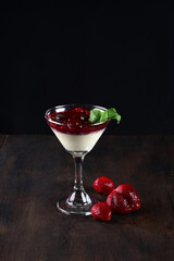 bowl with sweet dessert condensed milk with strawberry syrup tasty high-calorie food