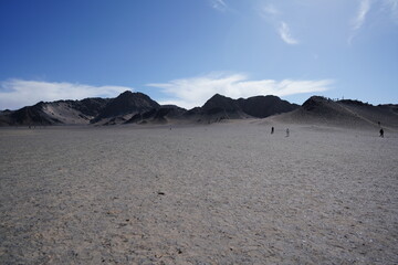 mountain covered by sands like snow
