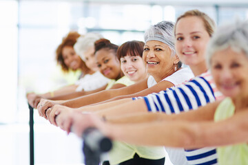 Barre, fitness and workout with portrait of women in studio for club, stretching and ballet exercise. Pilates, wellness and strength training with people in class for balance, health and diversity