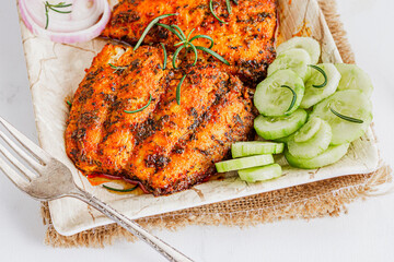 Grilled Fish Fillet with Cucumber and Onion Close-Up Healthy Food Photo