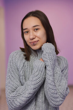 smile or frenulum piercing under the upper lip.