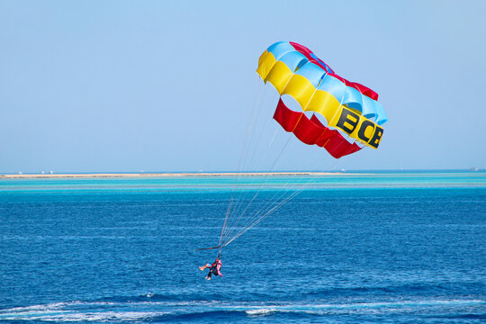 Man is fond of parasailing over Red Sea. resort in Egypt, Beautiful holidays