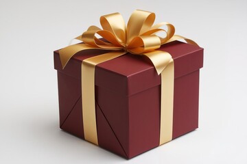 Elegant gift box with golden ribbon bow