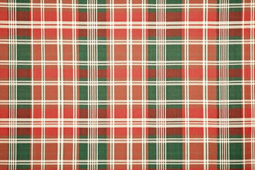 Festive red and green plaid pattern background for holiday designs