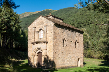 Fototapeta premium Romanesque church of Santa Maria de Iguacel from the 11th century in Larrosa. Huesca, Aragon, Spain.