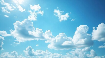 A bright blue sky filled with fluffy white clouds, evoking a sense of calm and tranquility.