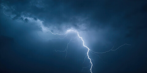 A stormy sky filled with ominous dark clouds, swirling and heavy with impending rain. Lightning occasionally flashes, illuminating the scene and creating a dramatic atmosphere