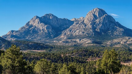 Obraz premium Majestic Mountains Under Clear Blue Sky