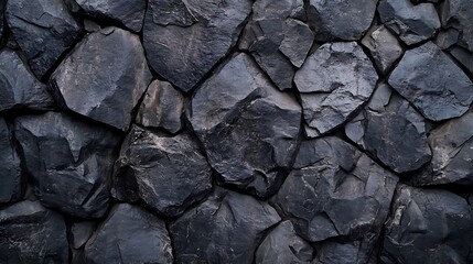 Coarse Black Stone Wall with Rugged Texture in Detailed Photography