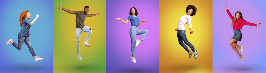 Full length of joyful millennial international people jumping together, smiling at camera over...
