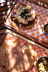 Traditional typical Mexican food, Mexican gastronomy concept. Tacos, chilaquiles, Mexican tradition.