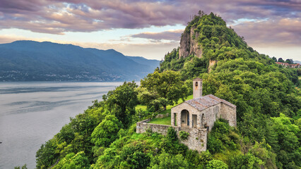 Aerial view of Rocca of Calde and Lake Maggiore in background during sunset, in the summer day,...
