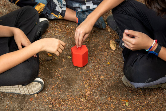 Pirinola traditional Mexican handmade wooden toy, children playing the hra del rereo. Perinola