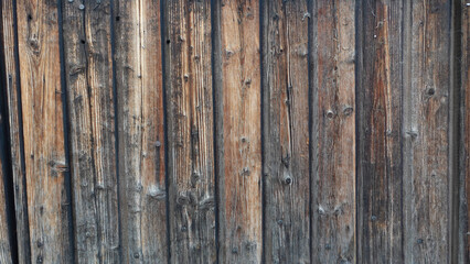 Rustic Wooden Fence With Natural Variations Against a Neutral Backdrop