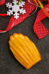 Madeleine, sweet biscuit dessert Christmas cookie treat Fresh delicious gourmet food background on the table rustic food top view copy space