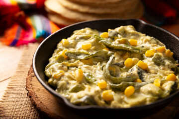Rajas con Crema. Very popular dish in Mexico that consists of strips of poblano chili with cream,...