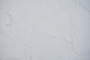 Concrete wall with crack, gray color background, cement rough surface texture. Renovation of old residential premises and apartments. 