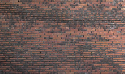 Panoramic background of textured wall with old and small bricks in reddish and gray tones