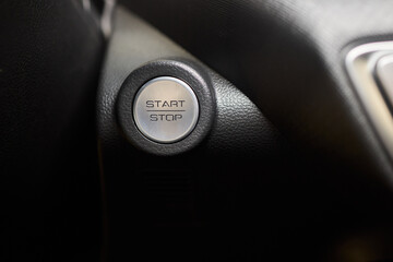 The image displays a detailed view of a cars start stop button