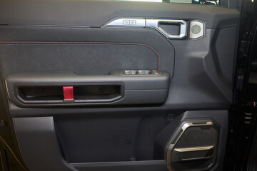 A car door with trim showcasing automotive design details