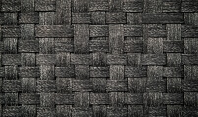 An abstract texture featuring dark charcoal woven patterns against a light gray background creates depth and visual intrigue in the design