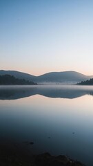 Fototapeta premium Mountains and lake, mirror image, calm image.