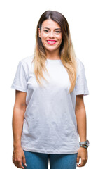 Obraz premium Young beautiful woman casual white t-shirt over isolated background with a happy and cool smile on face. Lucky person.