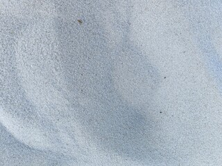 sand texture close up. White, yellow, beige sand close up. Beach sand - textured, with different lighting. River, sea, reef sand