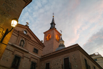 Church of Saint Genesius tower illuminated at dusk in Madrid, Spain - Landscape
