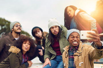 Selfie, funny and group of friends outdoor on vacation, getaway or adventure together for bonding. Goofy, travel and young people with photography picture for memory on holiday or weekend trip.