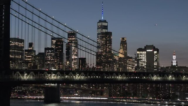 Aerial view of the subway crossing the Manhattan Bridge at night