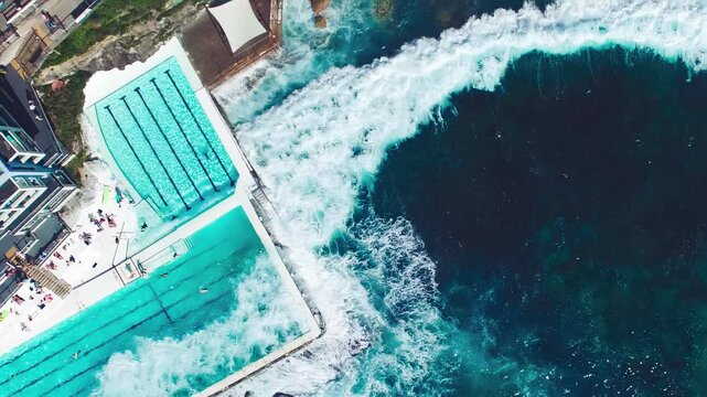 Overhead aerial view of Bondi Beach Pools on a sunny morning, Sydney, Australia
