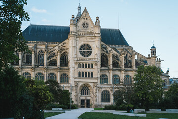 Fototapeta premium A stunning view of the Saint-Eustache Church in Paris, France. The architectural masterpiece showcases its grand Gothic design, featuring intricate stone detailing, large arched windows, and a magnifi
