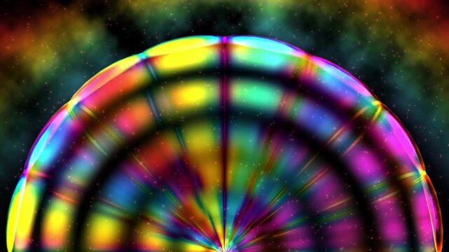 A colorful abstract design with a half-circle shape in the center, radiating light and color against a background of glittering stars.